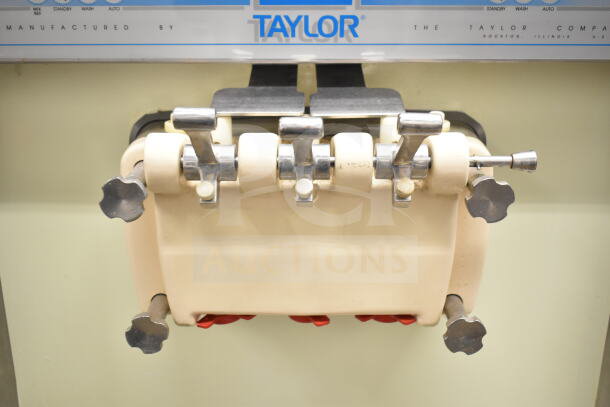 Taylor 754-33 commercial soft serve machine, water-cooled, 2-flavor with twist, on casters, 208-230V, 3 phase.