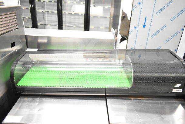 Emperor's Select 478CSD53HC sushi display case, glass front, green interior, commercial use, 115 volts, 1 phase.