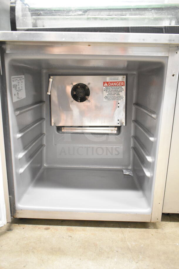 2023 Delfield 406P-STAR2 commercial undercounter cooler, single door, 115V, 1 phase, clean interior, caution label visible.