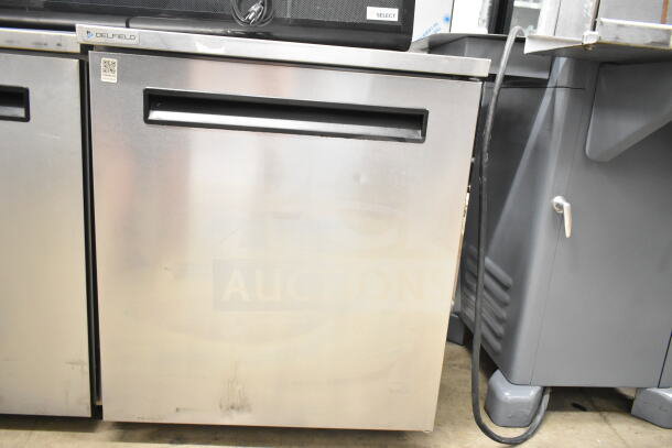 Delfield 406P-STAR2 commercial single door undercounter cooler, 115 volts, stainless steel finish, model tag visible.
