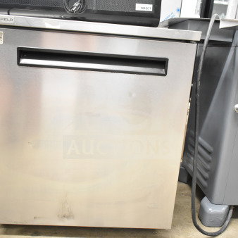 Delfield 406P-STAR2 commercial single door undercounter cooler, 115 volts, stainless steel finish, model tag visible.