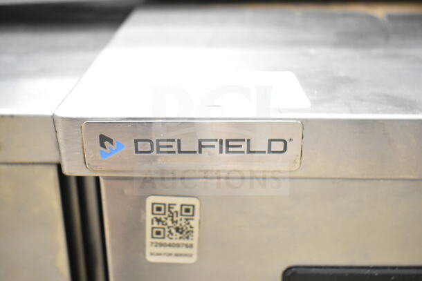 Delfield 406P-STAR2 commercial single door undercounter cooler, stainless steel, 115 volts, 1 phase, with brand label.