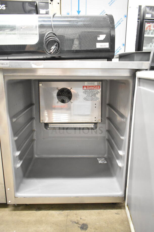 Delfield 406P-STAR2 commercial undercounter cooler, single door, 115V, 1 phase, used condition, interior fan, caution label.