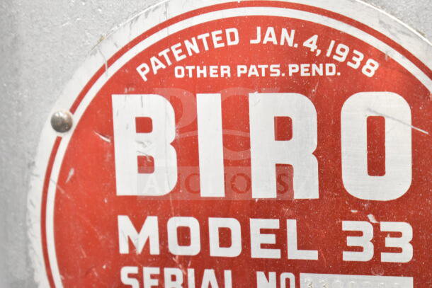 Biro 33 Commercial Floor Meat Saw label, patented Jan 4, 1938, shows model and serial number details.