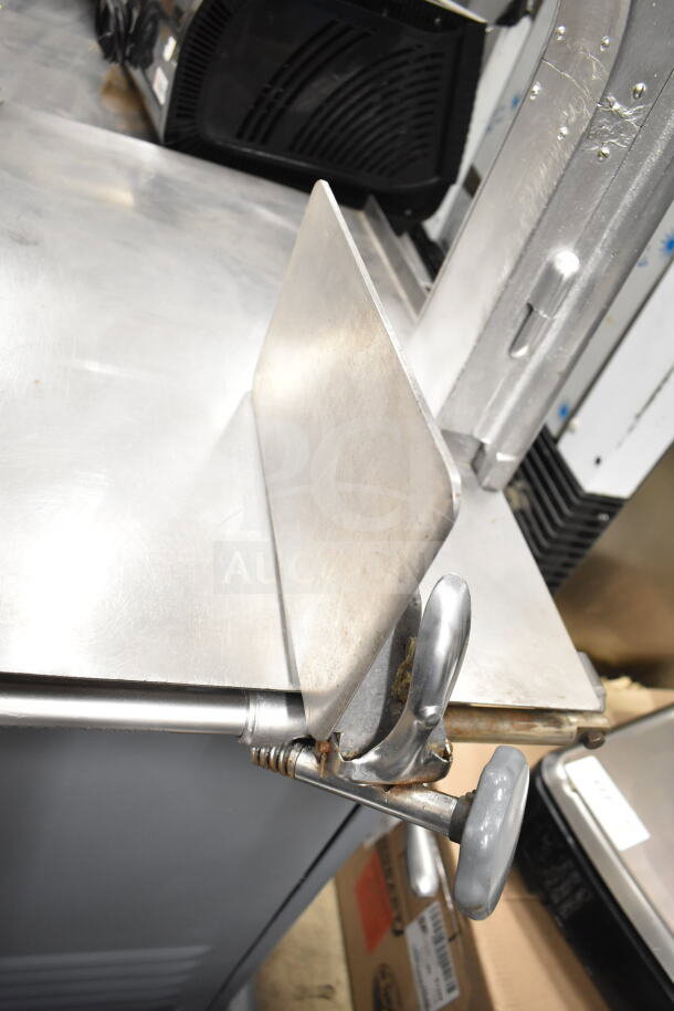 Biro 33 Commercial Meat Saw, floor style, stainless steel construction, adjustable handle, sturdy frame, excellent condition.