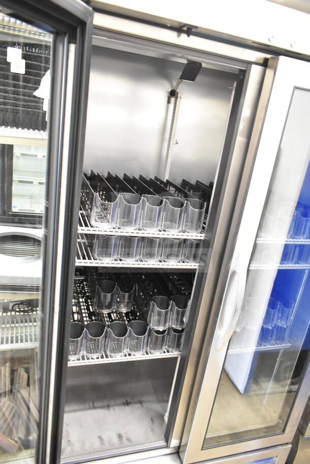 2022 True T-35G-HC Commercial 2 Door Reach In Cooler, glass doors, adjustable shelves, 115V, excellent condition.
