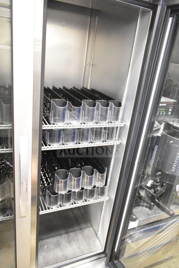 2022 True T-35G-HC commercial cooler, 2 glass doors, shelving, excellent condition, 115 volts, 1 phase.
