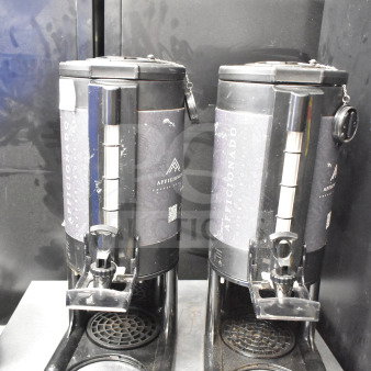 Two Afficionado countertop beverage dispensers; black with silver spout, branded label, and drip tray; fair condition.