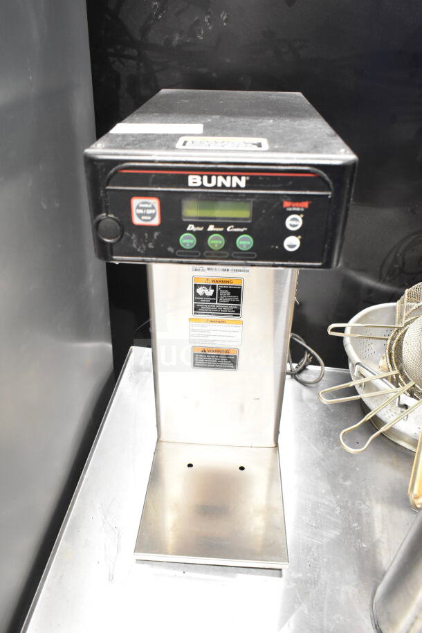 Bunn ICB-DV Commercial Countertop Coffee Machine, 120 Volts, 1 Phase. Features control panel and warning labels visible.