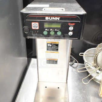 Bunn ICB-DV Commercial Countertop Coffee Machine, 120 Volts, 1 Phase. Features control panel and warning labels visible.