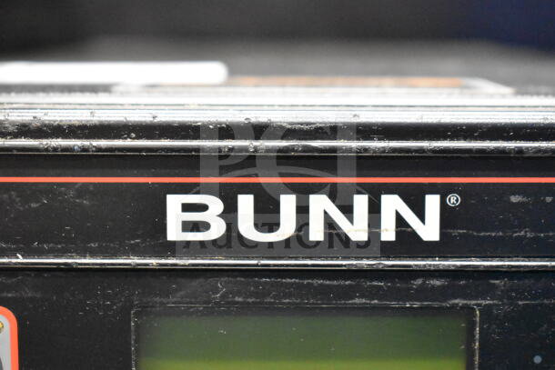Bunn ICB-DV commercial coffee machine, 120V, 1 phase, black exterior, Bunn logo visible, some surface wear.