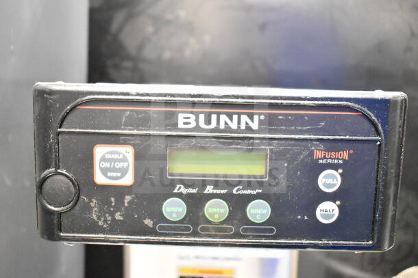 Bunn ICB-DV commercial coffee machine control panel. Features include on/off button, brew settings, and digital display.