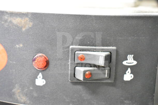 Avantco C10 commercial countertop coffee machine control panel with indicator lights and switches. 120 Volts, 1 Phase.