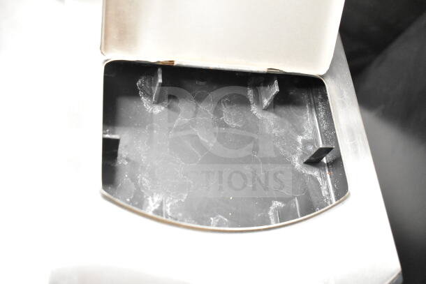 Avantco C10 Commercial Coffee Machine, stainless steel, 120V, condition shows wear in water reservoir area.