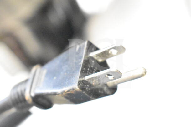Close-up image of a plug for the Avantco C10 Commercial Countertop Coffee Machine, 120 Volts, 1 Phase.