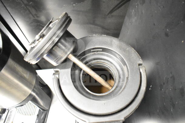 2 Luxus countertop coffee holders, dispenser view, stainless steel, durable, in good condition.