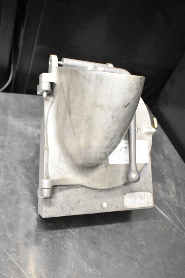 Pelican Head with grating blade, stainless steel, industrial kitchen equipment, intact condition, seen on a metal surface.