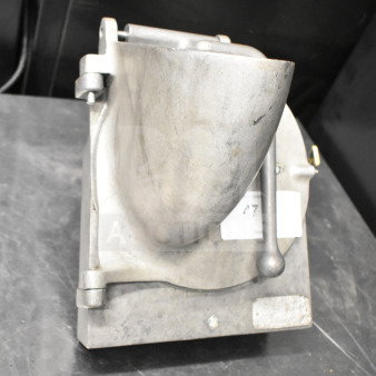 Pelican Head with grating blade, stainless steel, industrial kitchen equipment, intact condition, seen on a metal surface.