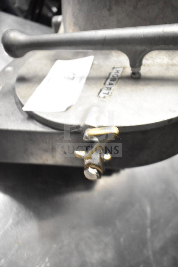 Pelican Head with Grating Blade, metal construction, Hobart label visible, lever mechanism, industrial kitchen equipment.