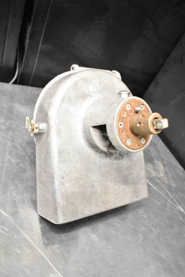 Pelican head with grating blade, metal construction, minor wear, includes mounting hardware, suitable for industrial use.