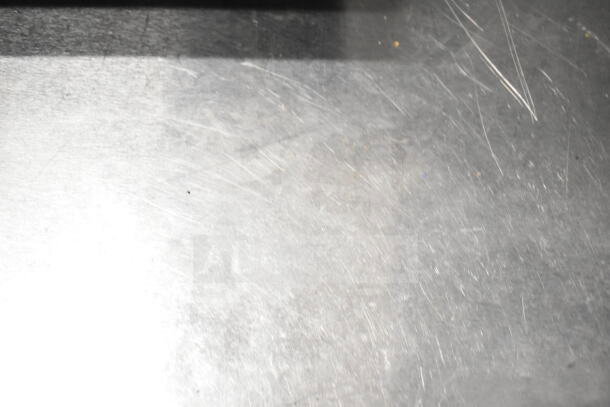 Delfield Commercial Single Door Undercounter Cooler, 115 volts, 1 phase. Scratched metal surface, worn condition.