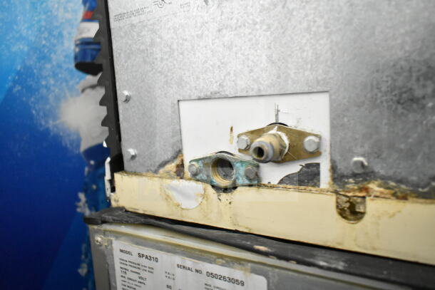 Manitowoc SD0452A ice head on SPA310 dispenser, 115V, 1 phase. Visible wear and corrosion on metal parts.
