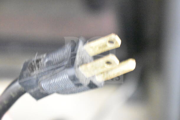 A close-up of a power plug for the Criotec CVZ-19 MRI cooler, 115 volts, 1 phase.