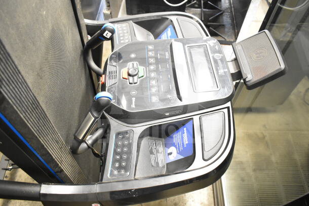 Horizon Folding Treadmill with digital display, dual handlebars, foldable design, and control panel in good condition.