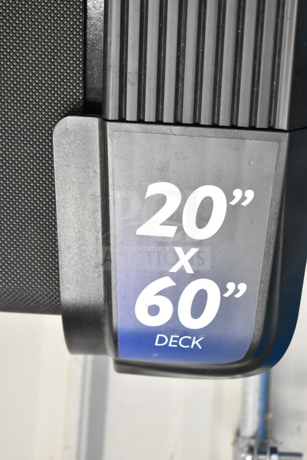 Horizon Folding Treadmill with 20"x60" deck, shown in good condition.