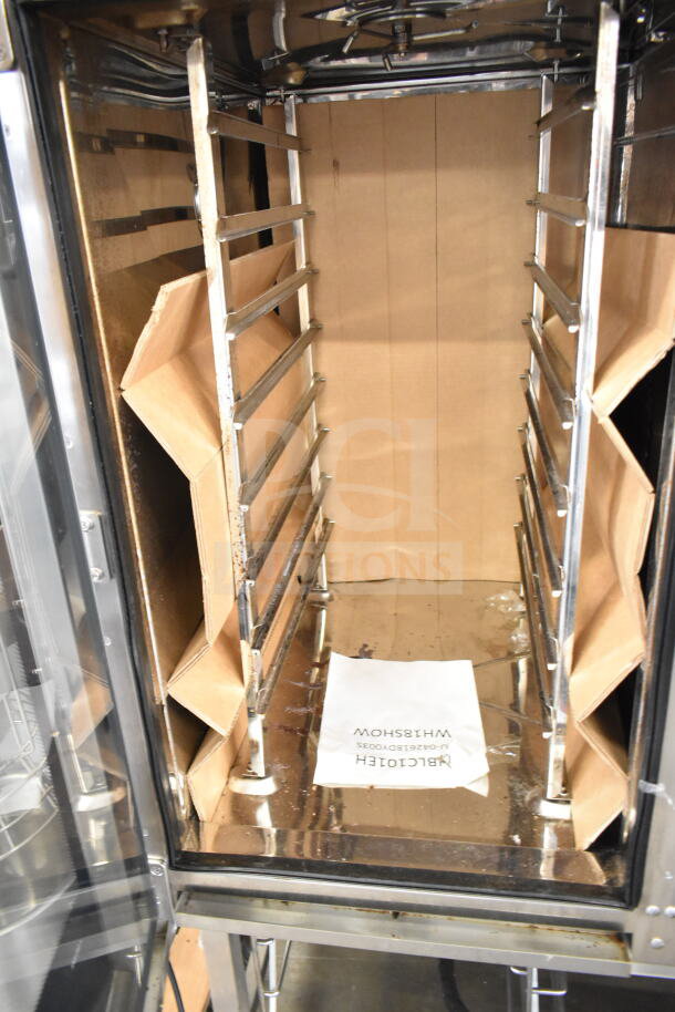 Brand new 2018 Blodgett BLCT-101H commercial electric combi convection oven. Interior racks and packaging visible.