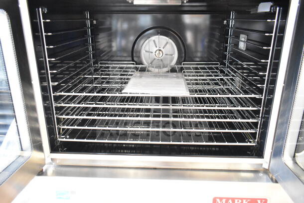 Brand new Blodgett Mark V convection oven with view-through doors, thermostatic controls; scratch and dent condition.