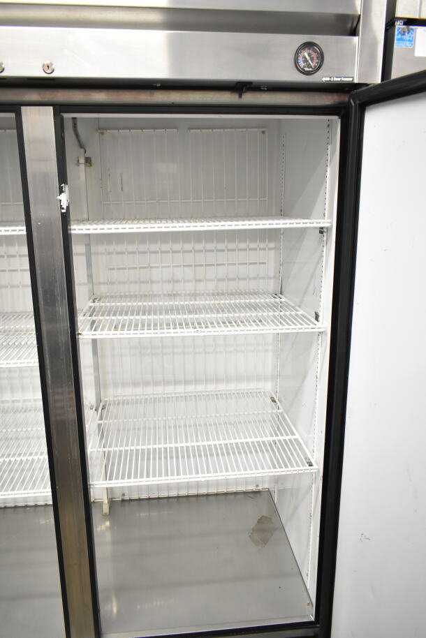 2016 True T-49F commercial 2-door reach-in freezer, 115 volts, 1 phase, clean interior with several wire shelves.