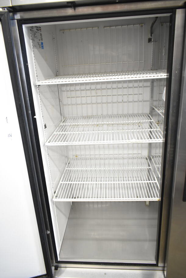 2016 True T-49F commercial 2-door reach-in freezer, 115 volts, 1 phase, clean interior, sturdy wire shelves.