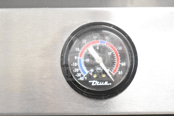 True T-49F Commercial Freezer, temperature gauge in focus, showing temp range. Durable steel exterior. 115V, 1 Phase.