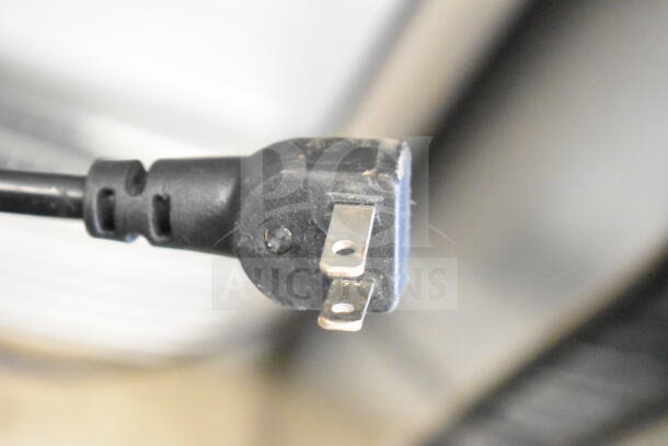 Close-up of a power plug for the Premium Levella PRF90DX cooler, showing a standard 115 volts, 1 phase configuration.