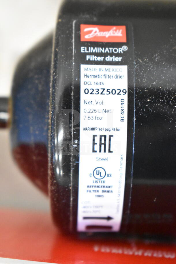 Two Danfoss 023Z5029 Eliminator Filter Driers, model DCL 163S, hermetic, made in Mexico, UL listed, refrigerant filter drier.