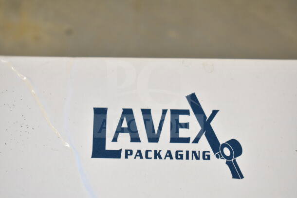 Brand new Lavex 562BAGSEALER bag sealing tape dispenser with minor scratches; visible Lavex Packaging logo.