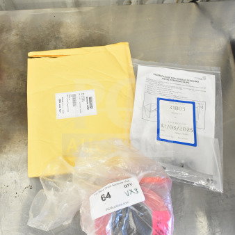 Three brand new items: Stacking clip kit, grater blade, bag sealer tape. All in original packaging, labeled for auction.