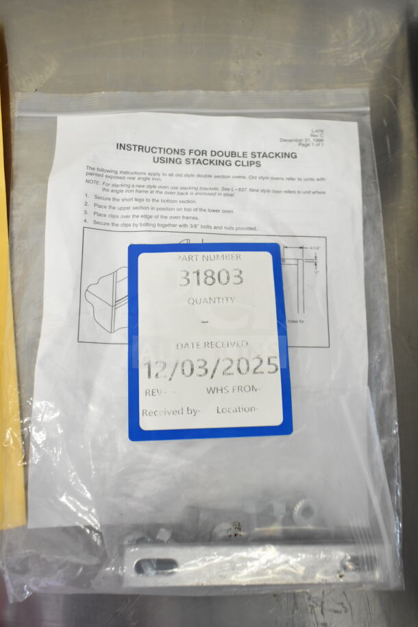 Brand new stacking clip kit with instructions, part number 31803. Received date: 12/03/2025.