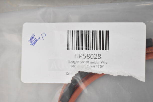 Barcoded label on Blodgett HP58028 Ignition Wire package, marked "Scratch and Dent." Includes part and ticket numbers.