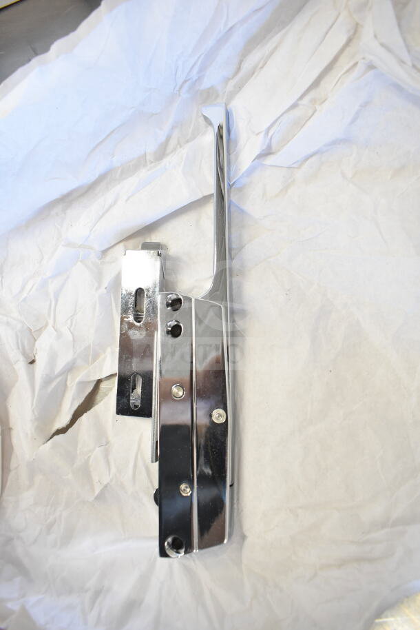 Chrome-finished combo latch in new condition, part of a mixed lot including ignition wire, Vitamix blade, and scooper.