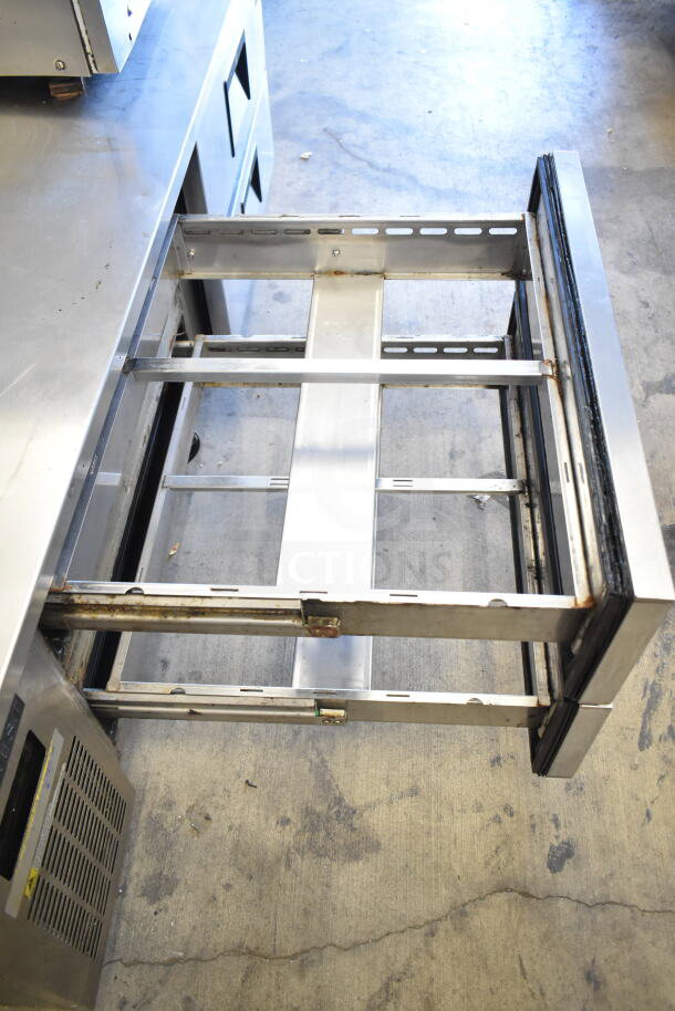 Everest Commercial 4 Drawer Chef Base on casters, stainless steel, 115V, 1 Phase; open drawer view, slight rust visible.