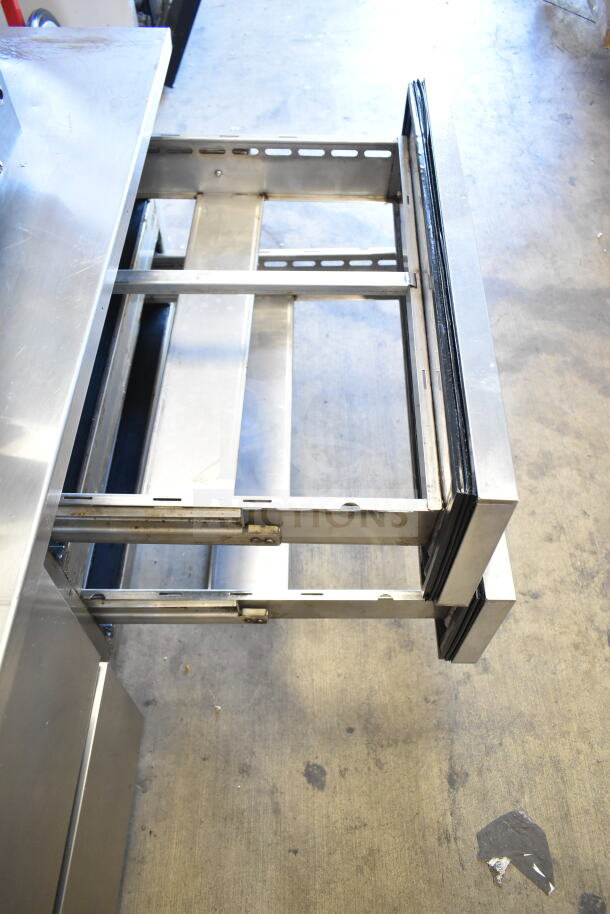 Everest Commercial 4 Drawer Chef Base with casters; stainless steel, 115V, 1 Phase. Open drawer shown, smooth glides.