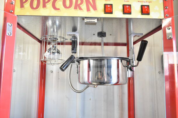 Carnival King 382PM30R Red Popcorn Machine on stand, commercial 8 oz. capacity, 120V, with controls, new condition.