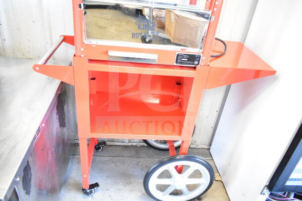 Carnival King 382PM30R popcorn machine, 8 oz., red, on stand, features visible logo and side tray, 120V, 1 phase.