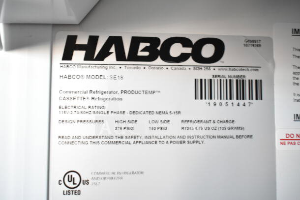 2019 Habco SE18 Commercial Cooler label showing model, electrical rating, design pressures, and refrigerant details.