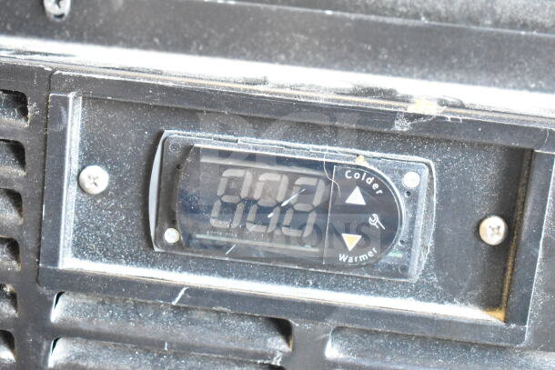 2019 Habco SE18 cooler thermometer display showing "8.8.8"; black frame with buttons for colder/warmer settings.