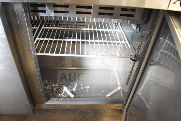 2025 Avantco 178SSPT48MHC Commercial Sandwich Salad Prep Table, bain marie mega top, 115V, interior shelving, used.