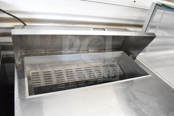 Continental SW36-10 commercial sandwich prep table. Features open mega top, stainless steel finish, operates at 115 volts, 1 phase.