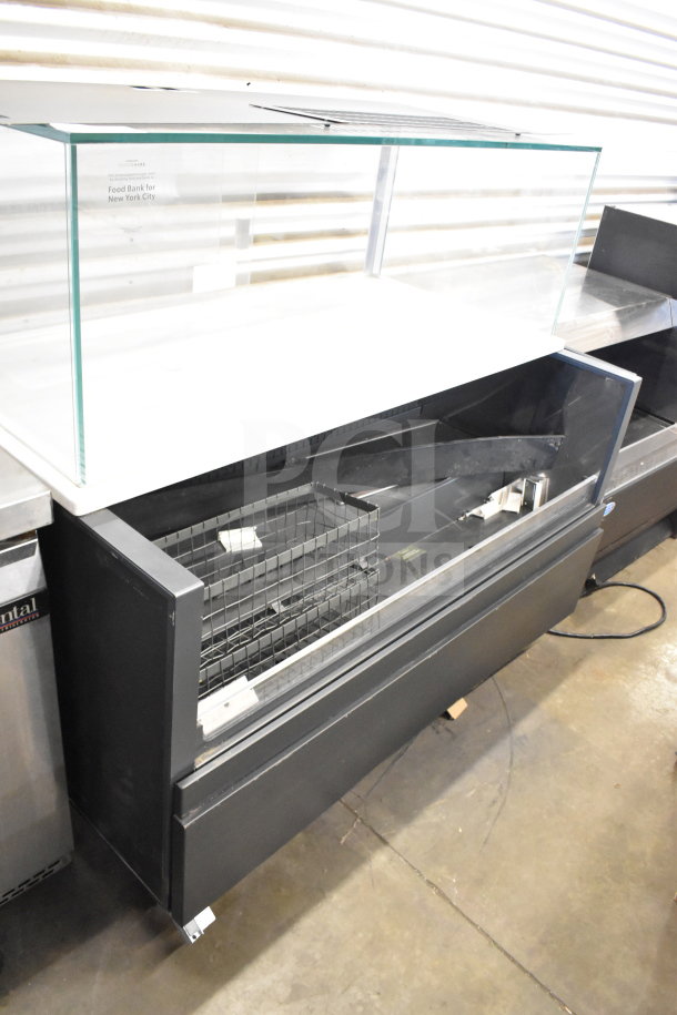 Commercial Horizontal Grab N Go Merchandiser with top dry display case. Features glass top, wire baskets, and sturdy build.